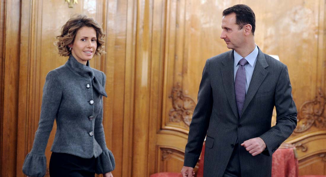 El presidente sirio Bashar al-Assad y su esposa, dicen, actuarán para la comunidad siria el 9 de diciembre de 2010 en París. Al-Assad está en una visita oficial de dos días a Francia. Photo de AFP Miguel Medina (el préstamo fotográfico debe leer Miguel Medina / AFP / Getty Images)